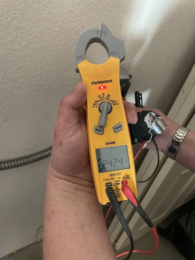 Voltage testing with clamp meter during Electrical Installation Services in Moores Mill
